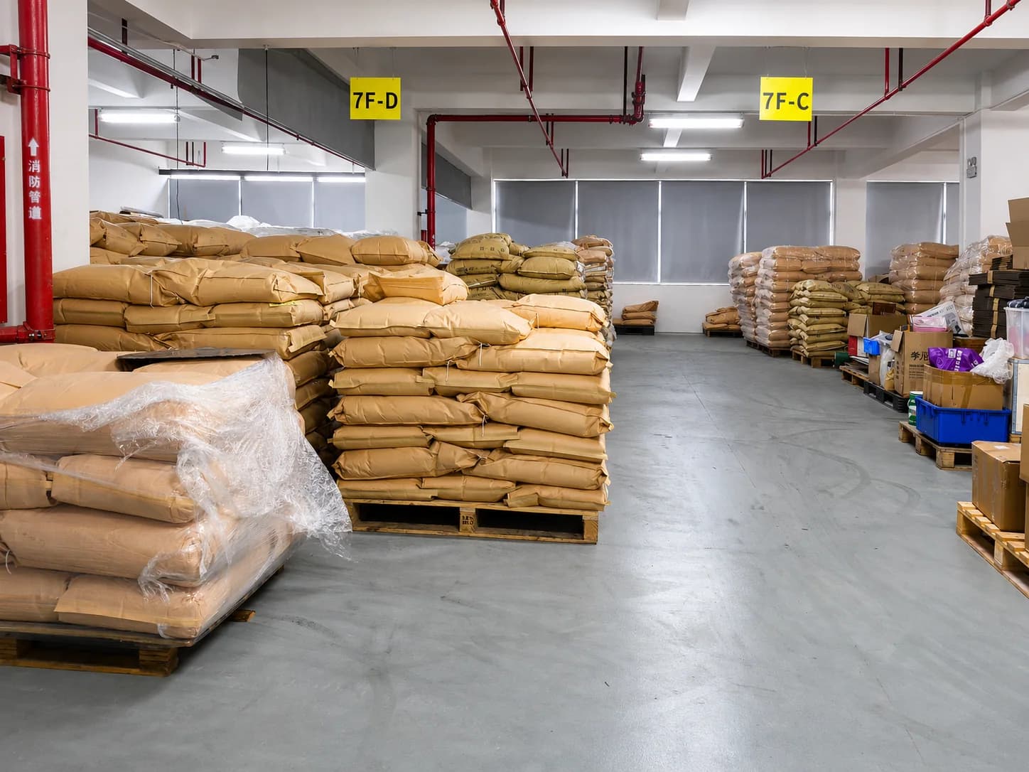 Packaged plastic additive raw materials arranged by production batch